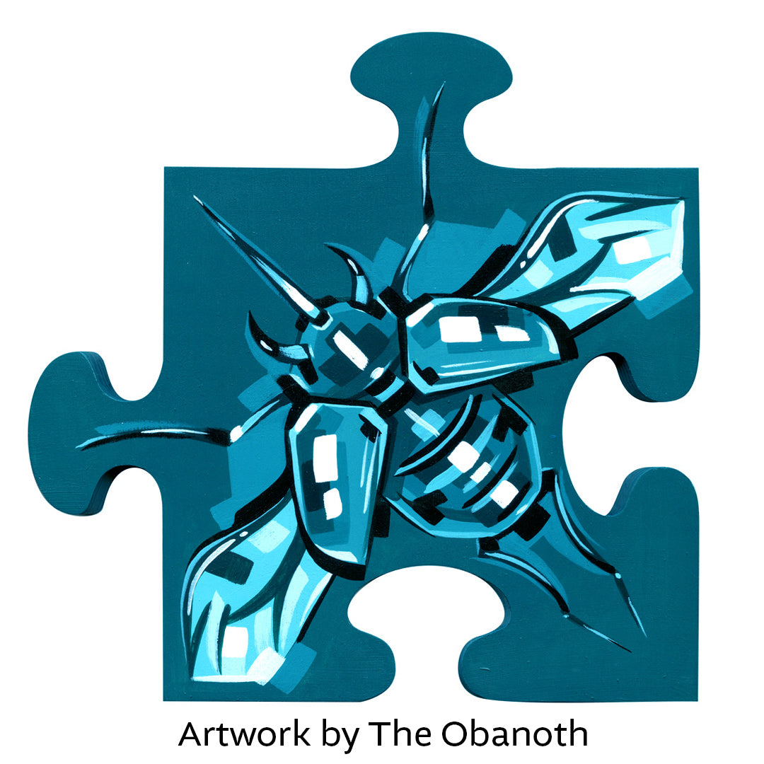 a painted puzzle piece with a bee on it